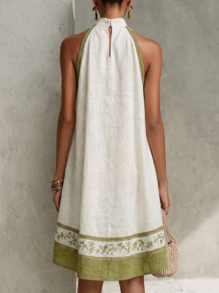 Elle | Sleeveless Floral Trapeze Mini Dress in White and Olive Green
